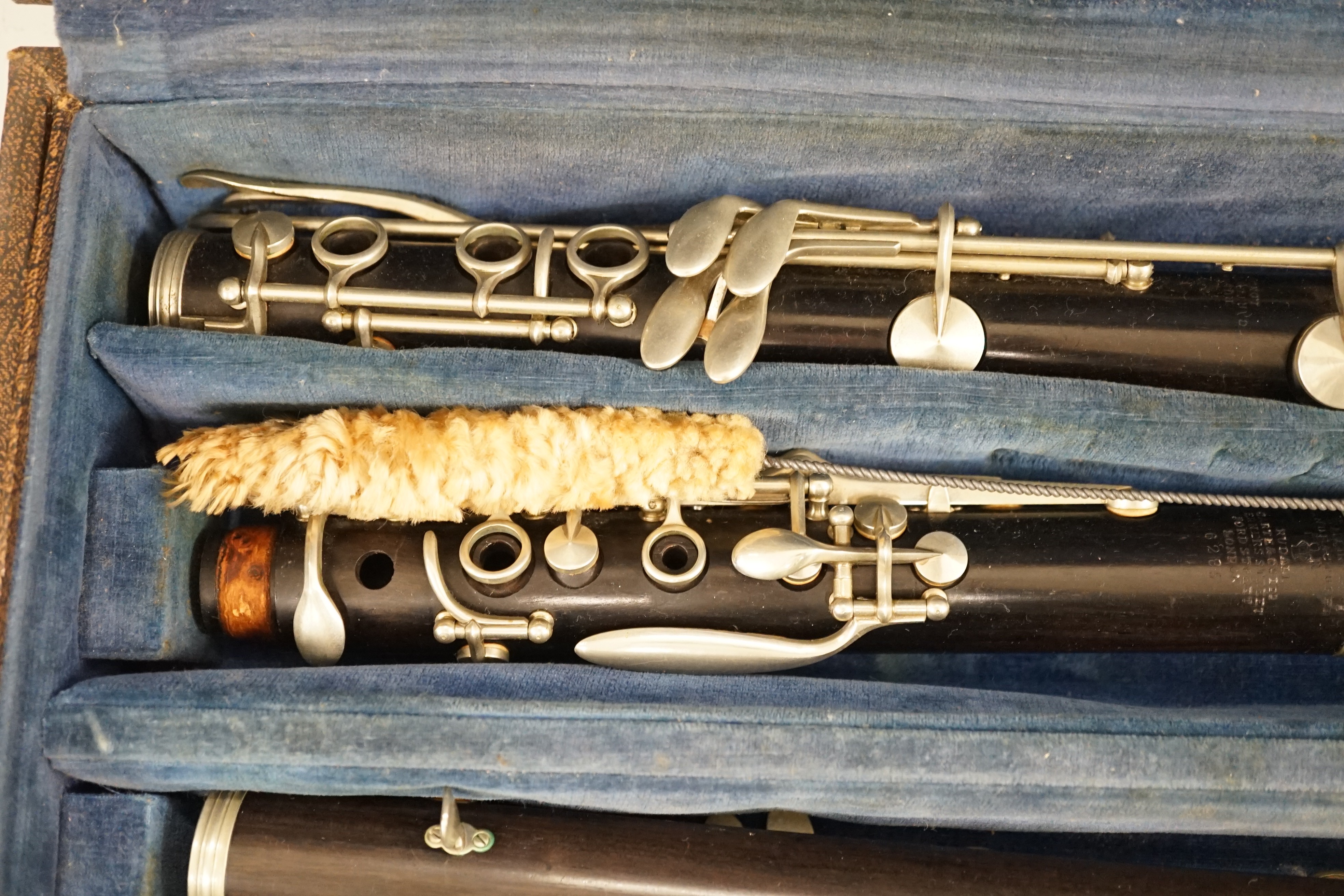 A cased pair of ebony jazz clarinets, 1920's, by Rudall, Carte & Co.